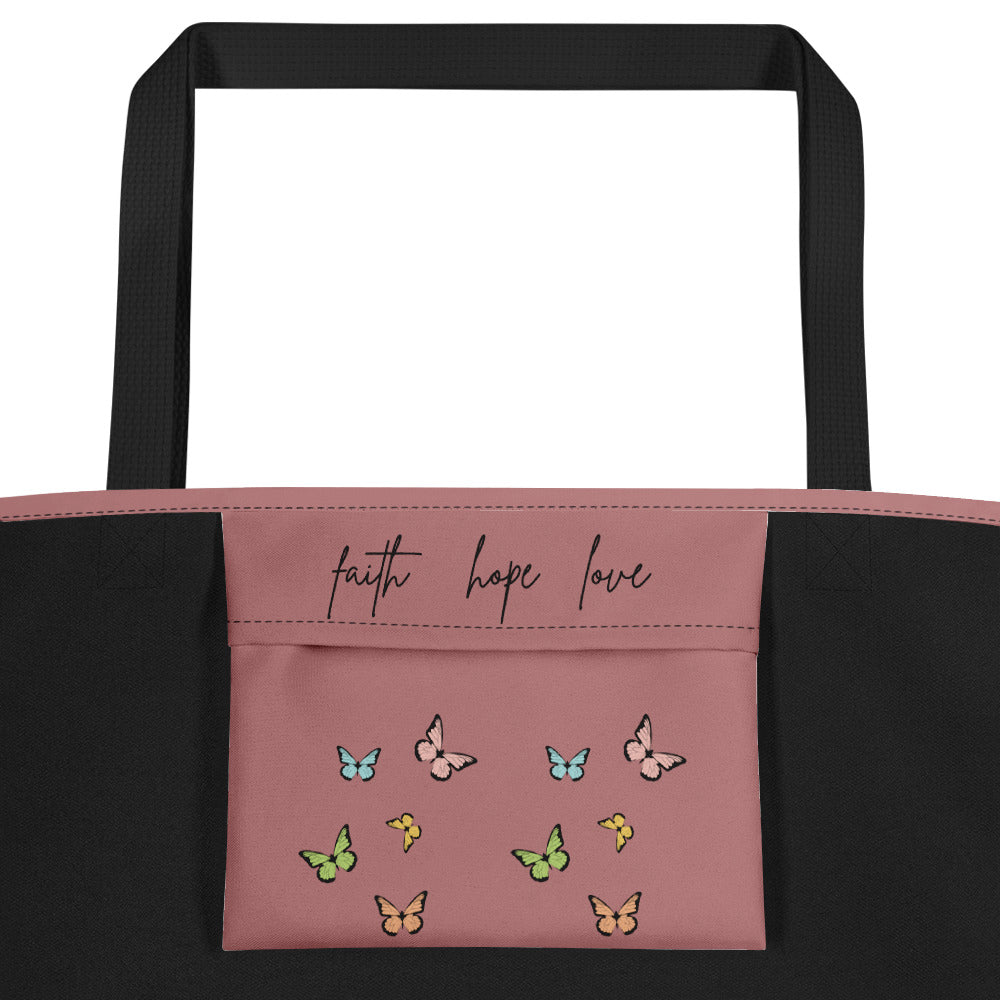 Stay organized in style with The&nbsp;Faith Hope Love Large Tote Bag.&nbsp; &nbsp;Perfect for both outdoor excursions and work days, this sturdy tote is spacious and cute. Keep all your essentials together and never sacrifice fashion for function again. Get yours today!